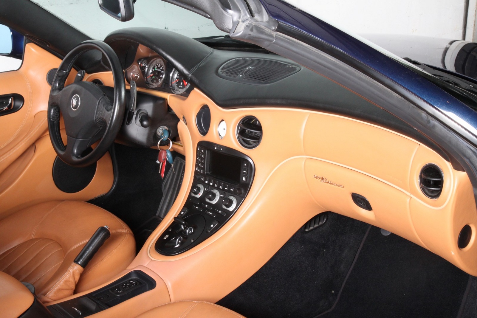 carros que farão você parecer rico de R$ 100 mil a R$ 150 mil maserati coupe 2002